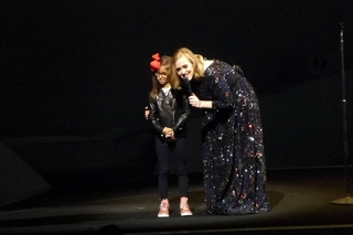 Adele live in Köln Cologne . 2016 - 10-year old girl on stage with Adele